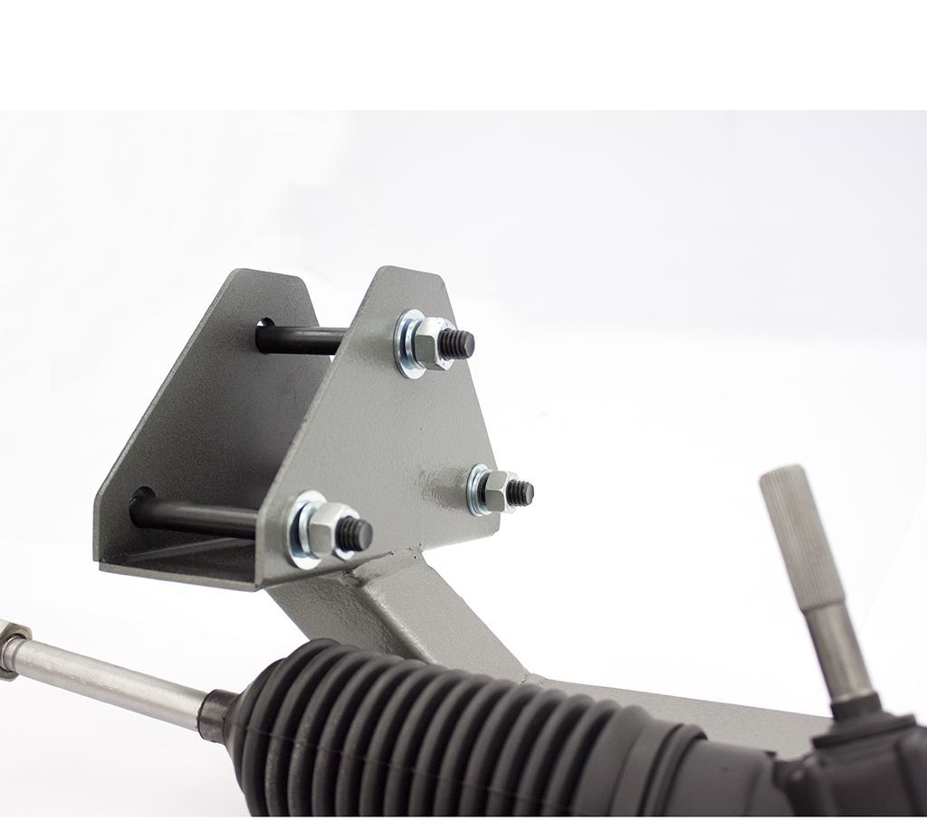 Close-up of the reinforced cradle mount bracket that bolts over the steering box mount